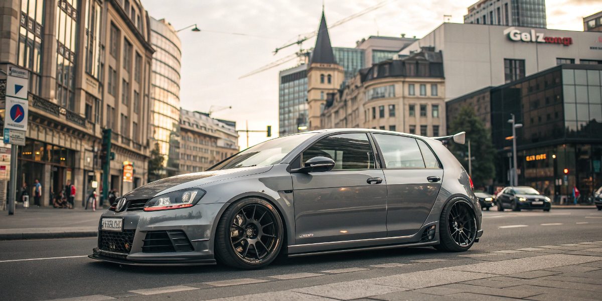 A modified new vw golf with aggressive body kit 1.jpg